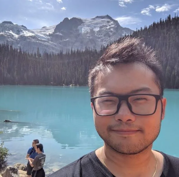 Jackie Ho, AI Product Manager, hiking in the mountains of Vancouver, BC